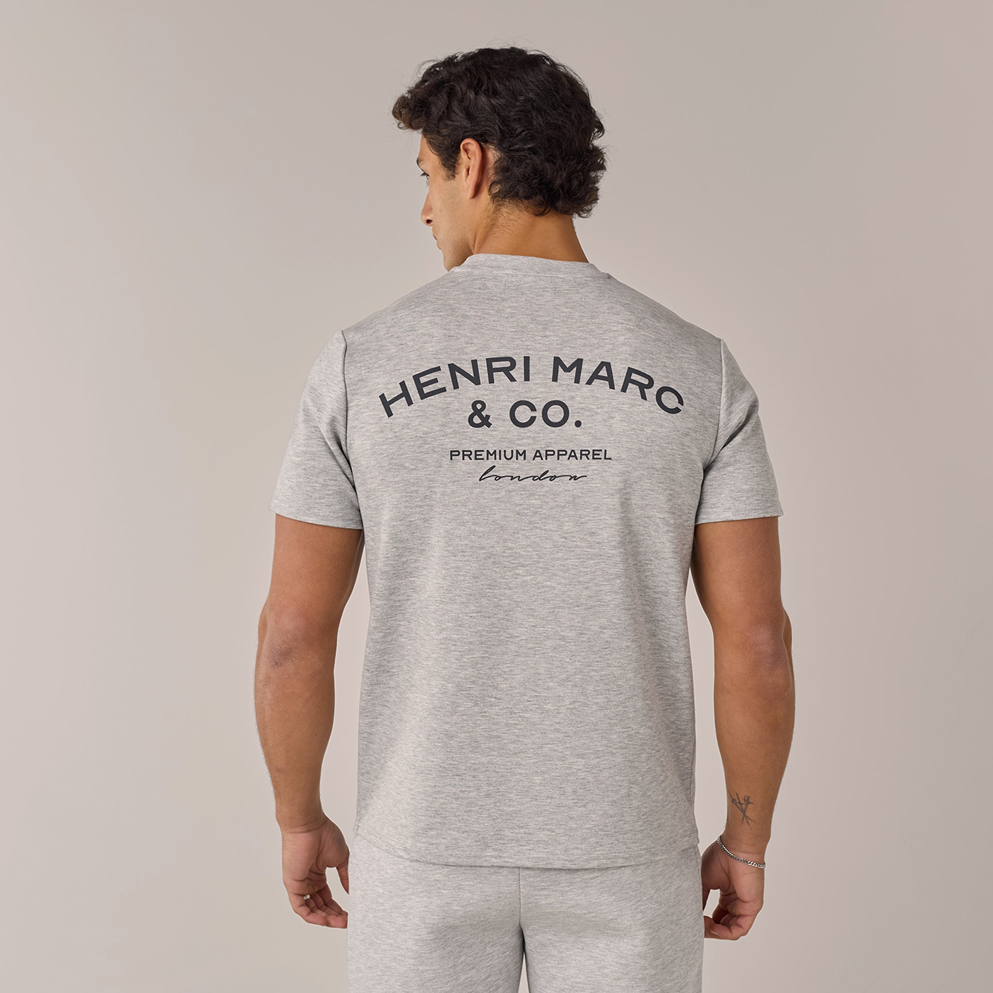 Men's  Grey Marl Crew Neck Premium Arch Logo T-Shirt  Henri. Marc & Co  Front View
